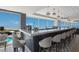 Oceanfront bar with seating and stunning ocean views at 5850 Gasparilla Rd # M7, Boca Grande, FL 33921