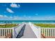 Walkway to beach with white sand and ocean views at 5850 Gasparilla Rd # M7, Boca Grande, FL 33921