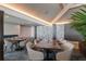 Upscale dining room with modern tables, chairs, and room divider at 5850 Gasparilla Rd # M7, Boca Grande, FL 33921