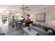 Open concept kitchen features modern appliances and breakfast bar at 5850 Gasparilla Rd # M7, Boca Grande, FL 33921