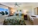 Spacious main bedroom with large windows and water views at 5850 Gasparilla Rd # M7, Boca Grande, FL 33921