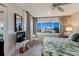 Main bedroom with water views and access to balcony at 5850 Gasparilla Rd # M7, Boca Grande, FL 33921