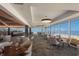 Bright dining room showcasing panoramic ocean views at 5850 Gasparilla Rd # M7, Boca Grande, FL 33921