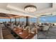 Elegant beachfront dining room featuring stunning ocean views at 5850 Gasparilla Rd # M7, Boca Grande, FL 33921