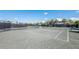 Well-maintained tennis courts with surrounding landscape at 5850 Gasparilla Rd # M7, Boca Grande, FL 33921