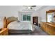 Main bedroom with wood furniture and sliding glass doors at 7297 Jennifer Dr, Port Charlotte, FL 33981