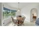 Bright breakfast nook with water views and wood table at 7297 Jennifer Dr, Port Charlotte, FL 33981