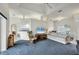 Open living room with a view to the kitchen and plenty of natural light at 7297 Jennifer Dr, Port Charlotte, FL 33981