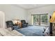 Relaxing living room featuring ample natural light and sliding glass doors at 7297 Jennifer Dr, Port Charlotte, FL 33981