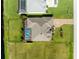An aerial view showcasing a single-Gathering home with pool and backyard at 912 Boundary Blvd, Rotonda West, FL 33947