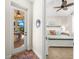 Bedroom and outdoor access with view of patio at 912 Boundary Blvd, Rotonda West, FL 33947