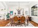 Elegant dining room with a chandelier and hardwood floors at 912 Boundary Blvd, Rotonda West, FL 33947