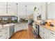 Modern kitchen with granite countertops and stainless steel appliances at 912 Boundary Blvd, Rotonda West, FL 33947