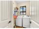 Bright laundry room with washer and dryer at 912 Boundary Blvd, Rotonda West, FL 33947