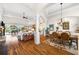 Open concept living and dining room with hardwood floors at 912 Boundary Blvd, Rotonda West, FL 33947
