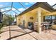 Outdoor kitchen with grill and seating at 912 Boundary Blvd, Rotonda West, FL 33947