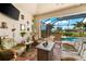 Outdoor patio features wicker furniture and pool view at 912 Boundary Blvd, Rotonda West, FL 33947