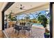 Covered patio with pool and spa views, perfect for entertaining at 912 Boundary Blvd, Rotonda West, FL 33947