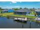 Home with private pool and dock, canal-front location at 9222 Melody Cir, Port Charlotte, FL 33981