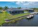 Canal-front property, features a private pool and dock at 9222 Melody Cir, Port Charlotte, FL 33981