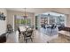 Casual dining area with access to a relaxing patio and scenic views at 9222 Melody Cir, Port Charlotte, FL 33981