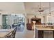 Bright dining room with sliders leading to the patio and water views at 9222 Melody Cir, Port Charlotte, FL 33981