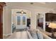 Bright and airy entryway with double doors and a view to an office at 9222 Melody Cir, Port Charlotte, FL 33981