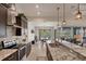 Granite countertops and stainless steel appliances highlight this lovely kitchen at 9222 Melody Cir, Port Charlotte, FL 33981