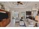 Spacious living room with a comfortable seating area and a view of kitchen at 9222 Melody Cir, Port Charlotte, FL 33981