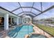 Screened pool and spa overlooking the canal at 9222 Melody Cir, Port Charlotte, FL 33981