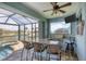 Outdoor kitchen and bar with pool views at 9222 Melody Cir, Port Charlotte, FL 33981