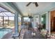 Covered patio with pool and outdoor kitchen at 9222 Melody Cir, Port Charlotte, FL 33981