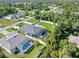 Aerial view of the house and neighborhood at 126 Spur Dr, Rotonda West, FL 33947