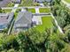 Aerial view of the house and the surrounding landscape at 126 Spur Dr, Rotonda West, FL 33947