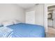 Bedroom with a queen-size bed and private bathroom access at 126 Spur Dr, Rotonda West, FL 33947