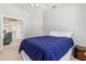 Bedroom with a queen bed and access to another room at 126 Spur Dr, Rotonda West, FL 33947