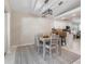 Bright dining area with table and chairs, adjacent to kitchen at 126 Spur Dr, Rotonda West, FL 33947