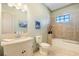 Clean bathroom with a bathtub, toilet and vanity at 150 Mandalay Rd, Punta Gorda, FL 33950