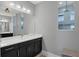 Bathroom with double vanity and walk in shower at 15448 Melport Cir, Port Charlotte, FL 33981