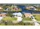 Aerial view of canal-front home with private dock at 15546 Viscount Cir, Port Charlotte, FL 33981