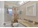 Bathroom with tub, shower, and vanity at 15546 Viscount Cir, Port Charlotte, FL 33981