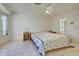 Main bedroom with a double bed and ensuite bathroom access at 1951 Greenlawn Dr, Englewood, FL 34223