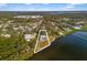 Aerial view of waterfront property with large lot and private dock at 1990-B Bayshore Dr, Englewood, FL 34223