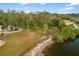 Peaceful waterfront lot with mature trees and a tranquil atmosphere at 1990-B Bayshore Dr, Englewood, FL 34223