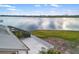 Scenic waterfront view from home's deck, overlooking calm waters at 1990-B Bayshore Dr, Englewood, FL 34223