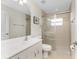 Updated bathroom with single vanity and walk-in shower at 233 Marker Rd, Rotonda West, FL 33947