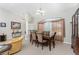 Elegant dining room featuring a large table and matching chairs at 233 Marker Rd, Rotonda West, FL 33947