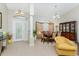 Formal dining room with a wood table, chairs, and a china cabinet at 233 Marker Rd, Rotonda West, FL 33947