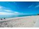 Relaxing beach with white sand and blue water at 26866 Weiskopf Dr, Englewood, FL 34223