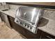 Stainless steel grill with granite countertop at 26866 Weiskopf Dr, Englewood, FL 34223